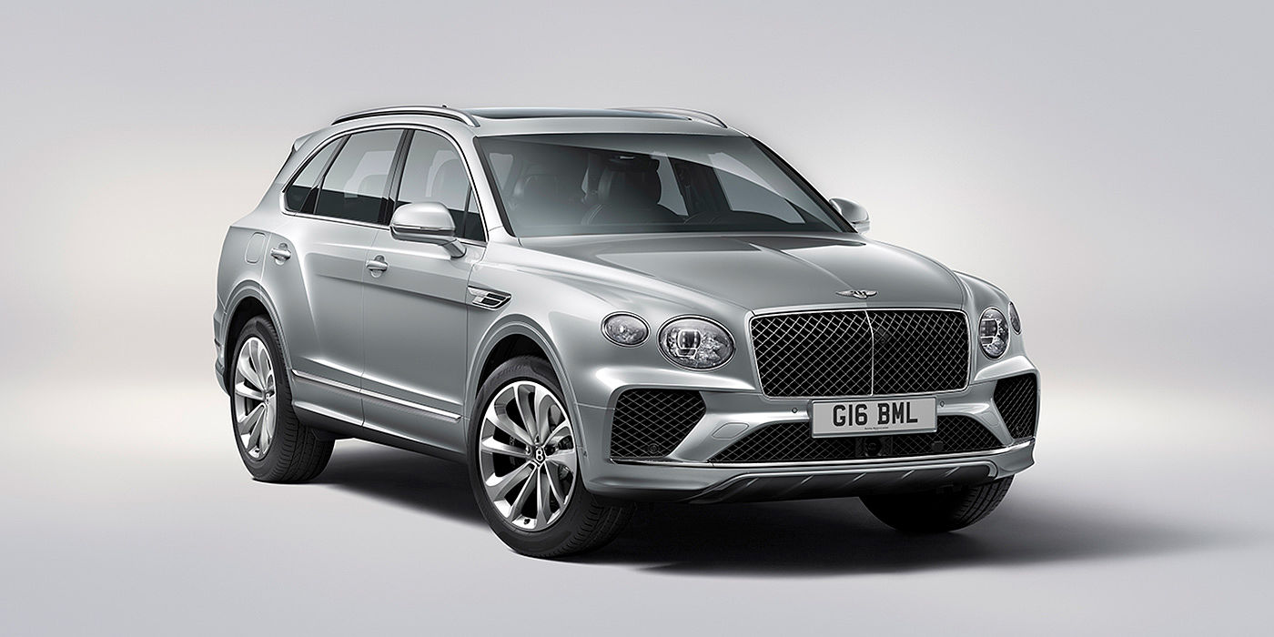 Bentley Brisbane Bentley Bentayga in Moonbeam paint, front three-quarter view, featuring a matrix grille and elliptical LED headlights.