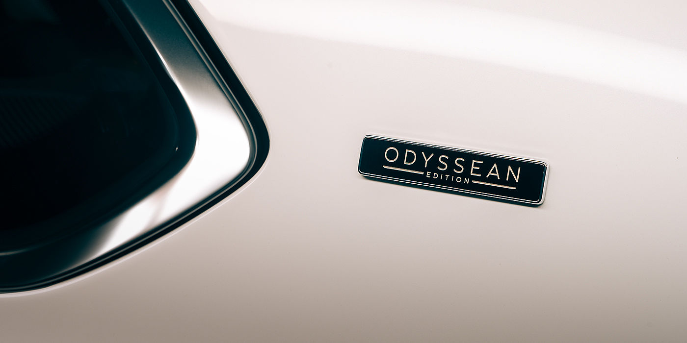 Bentley Brisbane Bentley Bentayga Odyssean Edition SUV Odyssean badge close up with Snow Quartz Pearlescent by Mulliner paint