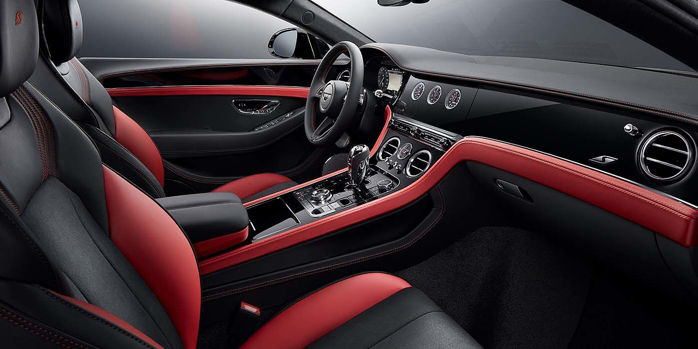 Bentley Brisbane Bentley Continental GT S coupe front interior in Beluga black and Hotspur red hide with high gloss Carbon Fibre veneer