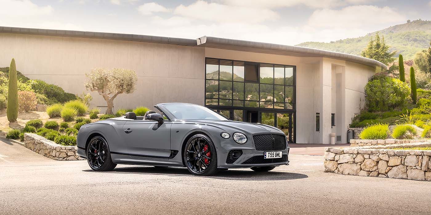Bentley Brisbane Bentley Continental GTC S convertible in Cambrian Grey paint front 34 static near house