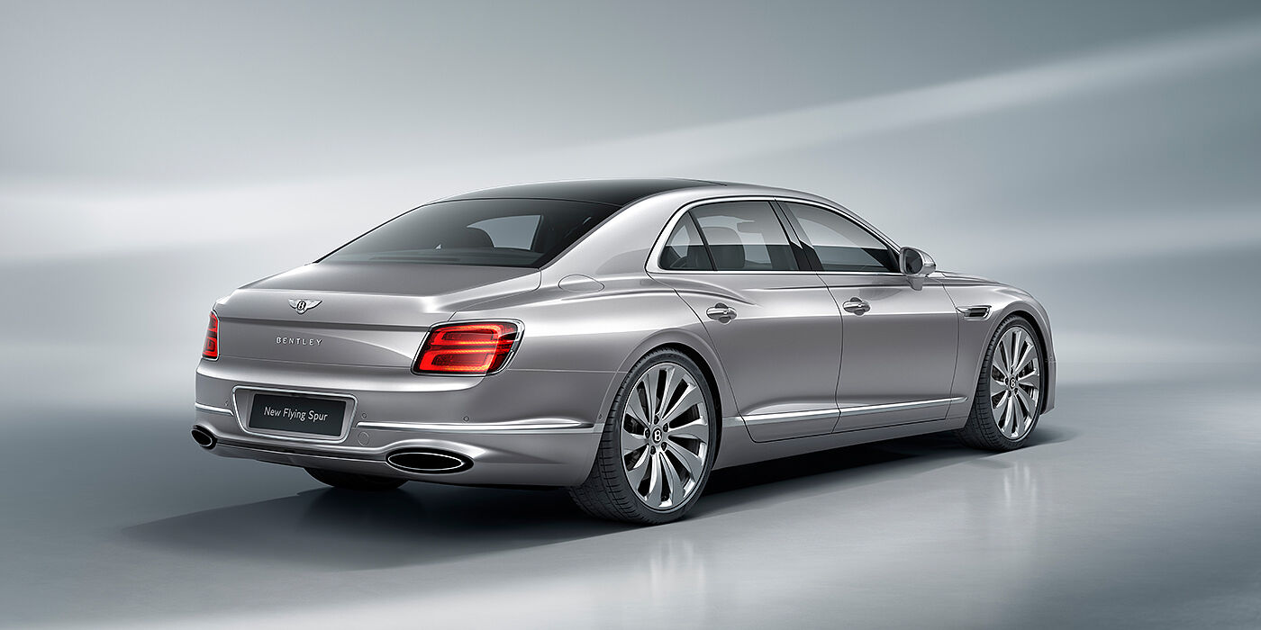 Bentley Brisbane New Bentley Flying Spur sedan rear view in Silverlake paint with ten spoke wheels and chrome matrix grille