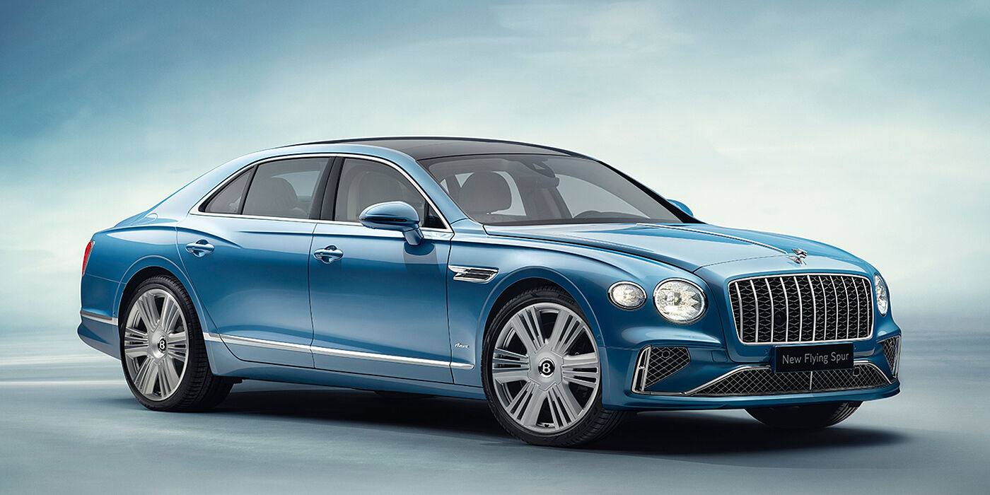 Bentley Brisbane New Bentley Flying Spur Azure sedan front view in Light windsor blue by Mulliner paint with 22 inch Azure wheels and chrome exterior details