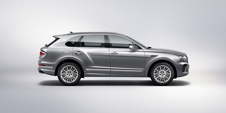 Bentley Brisbane Bentley Bentayga SUV side profile in Moonbeam silver paint against white background featuring 21 inch 5 spoke wheels