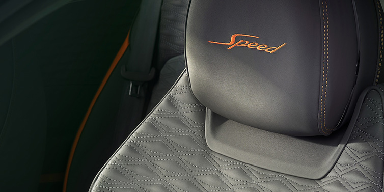 Bentley Brisbane Bentley Continental GT Speed coupe seat detail in Gravity Grey hide and Speed emblem in Mandarin by Mulliner coloured embroidery